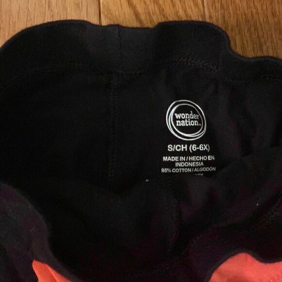 Size 6 leggings. Black is a capri length and the peach is regular length. - Picture 6 of 7